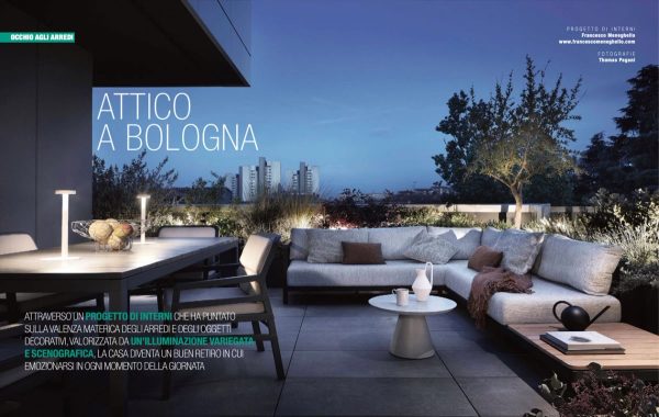 pagina di Come Ristrutturare la Casa aprile 2022, terrazza dell’attico a Bologna con dining outdoor e luce al tramonto
