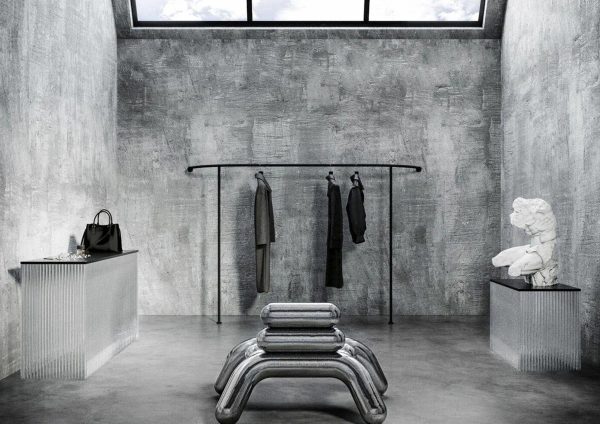 pagina di Interiors the Best ottobre 2022, guardaroba del Loft Industriale a Londra con rack a vista e panca cromata scultorea