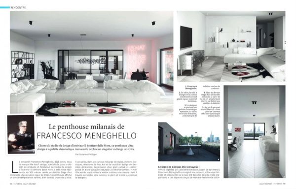 servizio su VIVADECO sul penthouse di Milano di Francesco Meneghello con living total white e terrazza con skyline