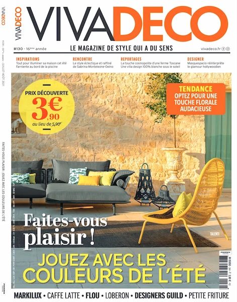 cover of VIVADECO, July 2021, outdoor setting with a sofa and yellow chair against a stone backdrop