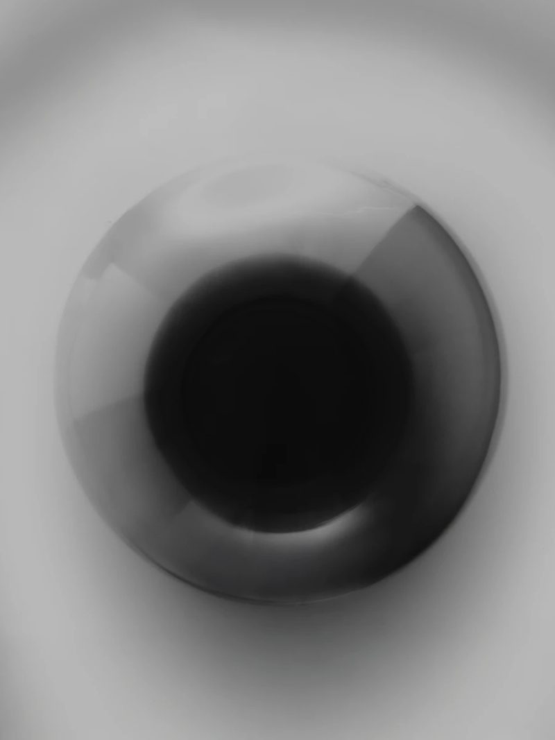 top-down view of the crystal sphere appearing as a dark concentric circle
