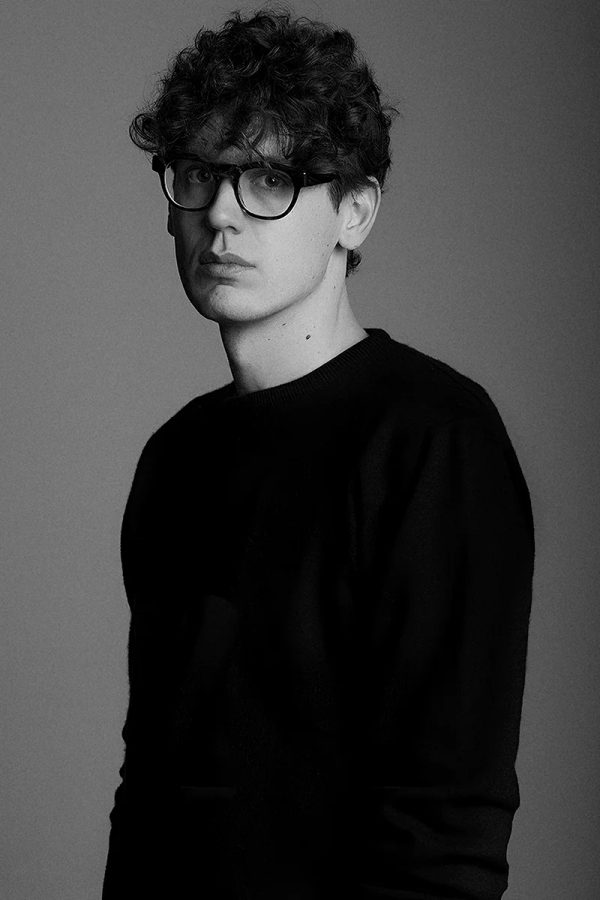 a half-length portrait of Francesco Meneghello by photographer Pier Costantini