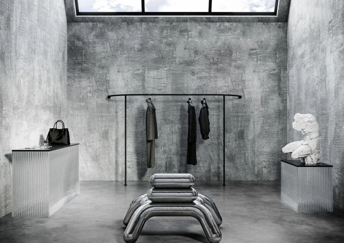 page in Interiors the Best October 2022, dressing area of the industrial loft in London with open rack and sculptural chrome bench