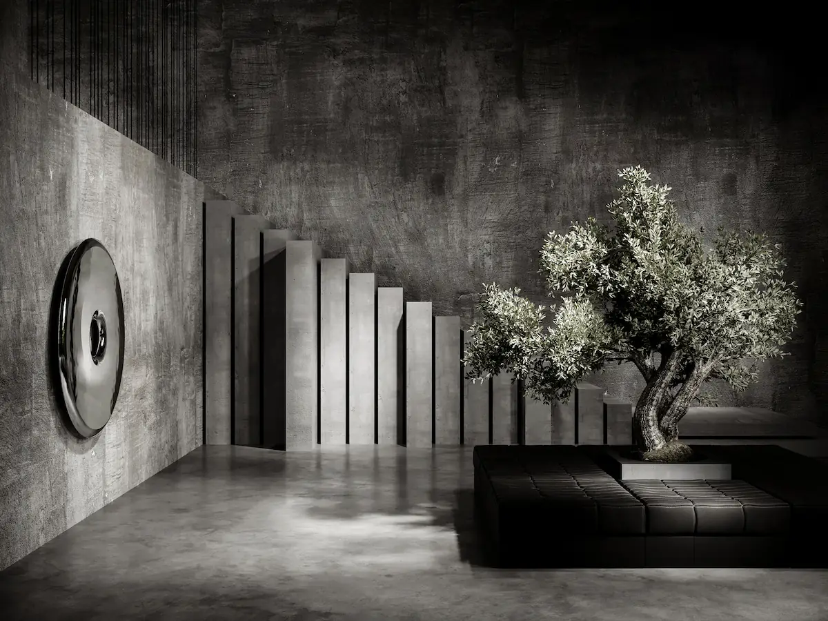 scenario luminoso di un angolo di loft industriale con finiture in cemento, pianta scultorea ed arredi moderni